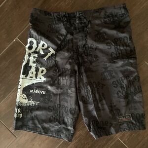 NWOT Troll Co. Black Graphic Board Shorts. Men’s 32”